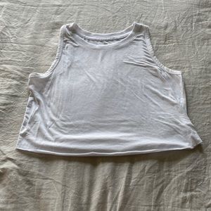 A white cropped tank top from So in size medium